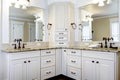 Luxury large white master bathroom cabinets with double sinks. Royalty Free Stock Photo