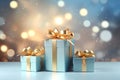 Luxury light blue gift boxes with golden ribbon bow. Festive Christmas background and bokeh lights Royalty Free Stock Photo