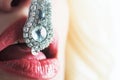 Luxury lips and jewelry. Luxury lifestyle. Macro and close up creative theme, beautiful female lips with pink lipstick Royalty Free Stock Photo