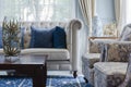 Luxury living room with sofa on blue pattern carpet at home