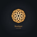 Luxury logotype in the shape of a flower for antique boutique. Gold logo, flower. Simple geometric sign. Icons, business, invitati