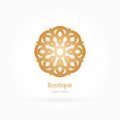 Luxury logotype in the shape of a flower for antique boutique. Gold logo, flower. Simple geometric sign. Icons, business, invitati