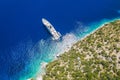 Luxury lonely yacht boat in turquoise blue sea on secluded remote coast of Kefalonia Ionian island, Greece Royalty Free Stock Photo