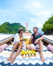 Luxury Longtail boat in Krabi Thailand, couple man and woman on a trip at the tropical island 4 Island trip in Krabi