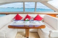 Luxury lunch table setting on a luxury yacht interior Royalty Free Stock Photo