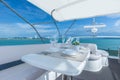 Luxury lunch table setting on a yacht interior Royalty Free Stock Photo