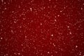 Luxury, magic and happy holidays background, golden sparkling glitter, gold stars and magical glow on festive red Royalty Free Stock Photo