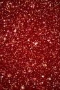 Luxury, magic and happy holidays background, golden sparkling glitter, gold stars and magical glow on festive red Royalty Free Stock Photo