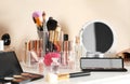 Luxury makeup products and accessories on dressing table with mirror Royalty Free Stock Photo