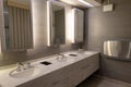 Luxury marble basin with light in mirror in public toilet Royalty Free Stock Photo