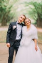 Luxury married wedding couple embracing in autumn park