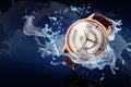 Luxury men`s watch in water splashes demonstrating its waterproof