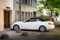 Luxury Mercedes-Benz CLK convertible car entering through garage