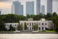 Luxury Miami waterfront mansion with palm trees