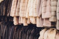 Luxury mink coats. Grey, brown, pearl color fur coats on showcase of market. Best gift for women is mink coat. Outerwear
