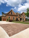 Luxury Model Home Exterior stone driveway