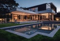 Luxury modern house with swimming pool at night. Royalty Free Stock Photo