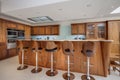 Luxury modern kitchen with breakfast bar and stools