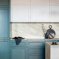 Luxury modern and vintage turquoise and white kitchen. Marble wall with white cabinets. Black vase with white dried flowers.