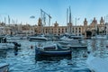 Luxury motor boats in Vittoriosa Yacht Marina at sunset.Holiday high class lifestyle travel concept.Boat trip in Mediterranean.