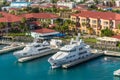 Luxury motor super yachts docked at the Cruise Port of Charlotte Amalie, St Thomas, USVI, Caribbean Royalty Free Stock Photo