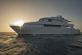 Luxury motor yacht at sea in sunset Royalty Free Stock Photo