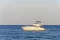 Luxury motor yacht under way out at sea
