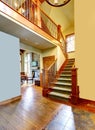 Luxury mountain home hallway with staircase. Royalty Free Stock Photo