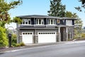 Luxury new construction home with stone veneer siding.