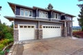 Luxury new construction home with stone veneer siding. Royalty Free Stock Photo