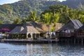 Luxury overwater thatched roof bungalow resort on Bora Bora Royalty Free Stock Photo