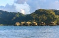 Luxury overwater thatched roof bungalow resort on Bora Bora Royalty Free Stock Photo