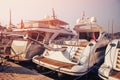 Luxury parked modern motor yacht marina dock in sea