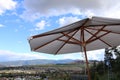 Luxury patio Umbrella`s- lake resort travel Royalty Free Stock Photo