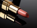 Luxury pink lipstick on black background. make-up Royalty Free Stock Photo