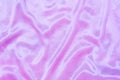 Luxury pink purple silk background. Rippled silk fabric, drapery cloth, or satin texture Royalty Free Stock Photo