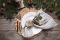 Luxury place setting with beautiful festive decor for Christmas dinner on wooden table, flat lay Royalty Free Stock Photo