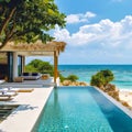 Luxury Pool Overlooking Serene Beach, ocean view, tropical foliage