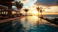 Luxury pool and beautiful view of sea at sunset . Royalty Free Stock Photo