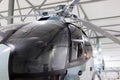 Luxury private helicopter parked in the hangar. Royalty Free Stock Photo