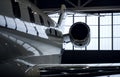 Luxury private jet plane in aviation hangar