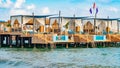 Luxury private lodges, sun beds and mini pools on a wooden dock in Antalya Royalty Free Stock Photo