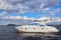 Luxury private motor yacht sailing in the bay