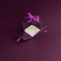 Luxury purple open gift box with purple ribbons. Product stage lit for Product template