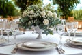 Luxury reception beautiful flowers, serving dishes, glasses on adorned table Royalty Free Stock Photo