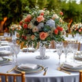 Luxury reception beautiful flowers, serving dishes, glasses on adorned table Royalty Free Stock Photo