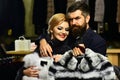 Luxury and relationship concept. Guy with beard and woman