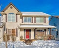 Luxury residential house with front yard in snow Royalty Free Stock Photo