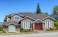 Luxury residential house with landscaped front yard and pawed pathway over it