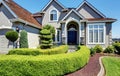 Luxury residential house with perfectly kept front garden. Royalty Free Stock Photo